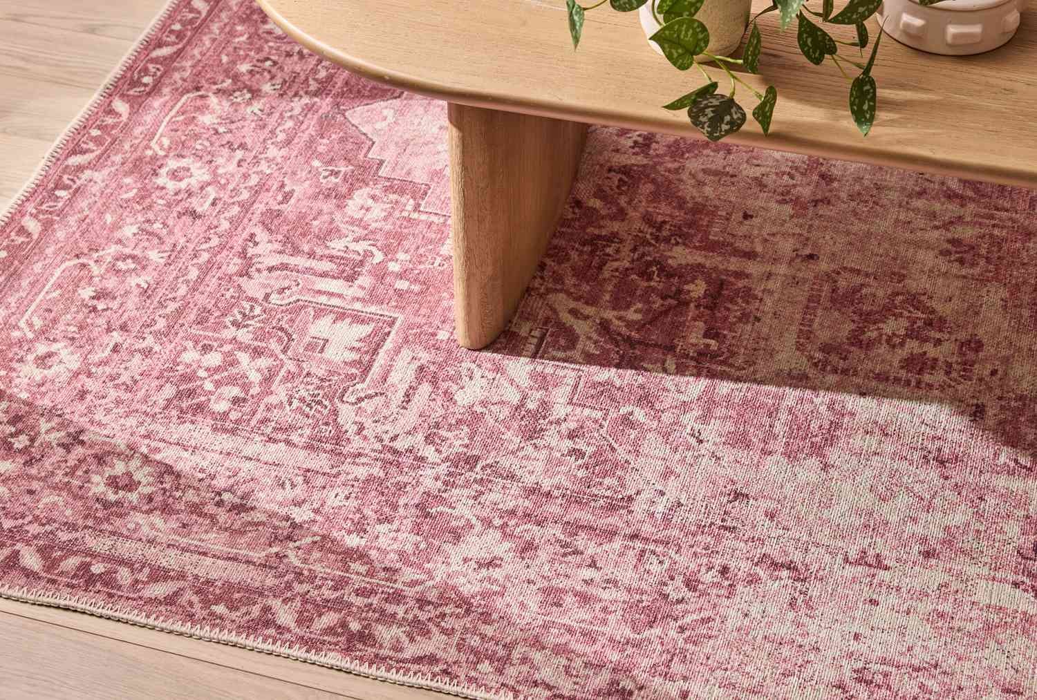 Machine woven rug on floor