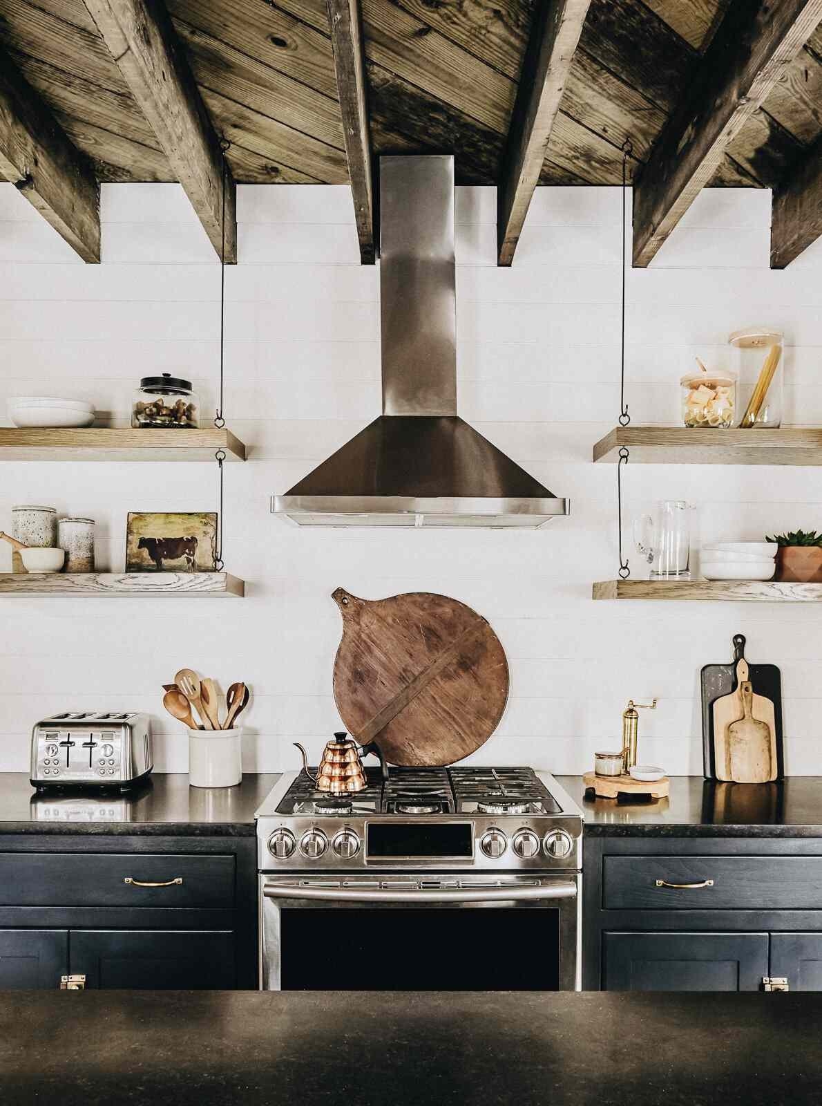 black cabinets in rustic kitchen