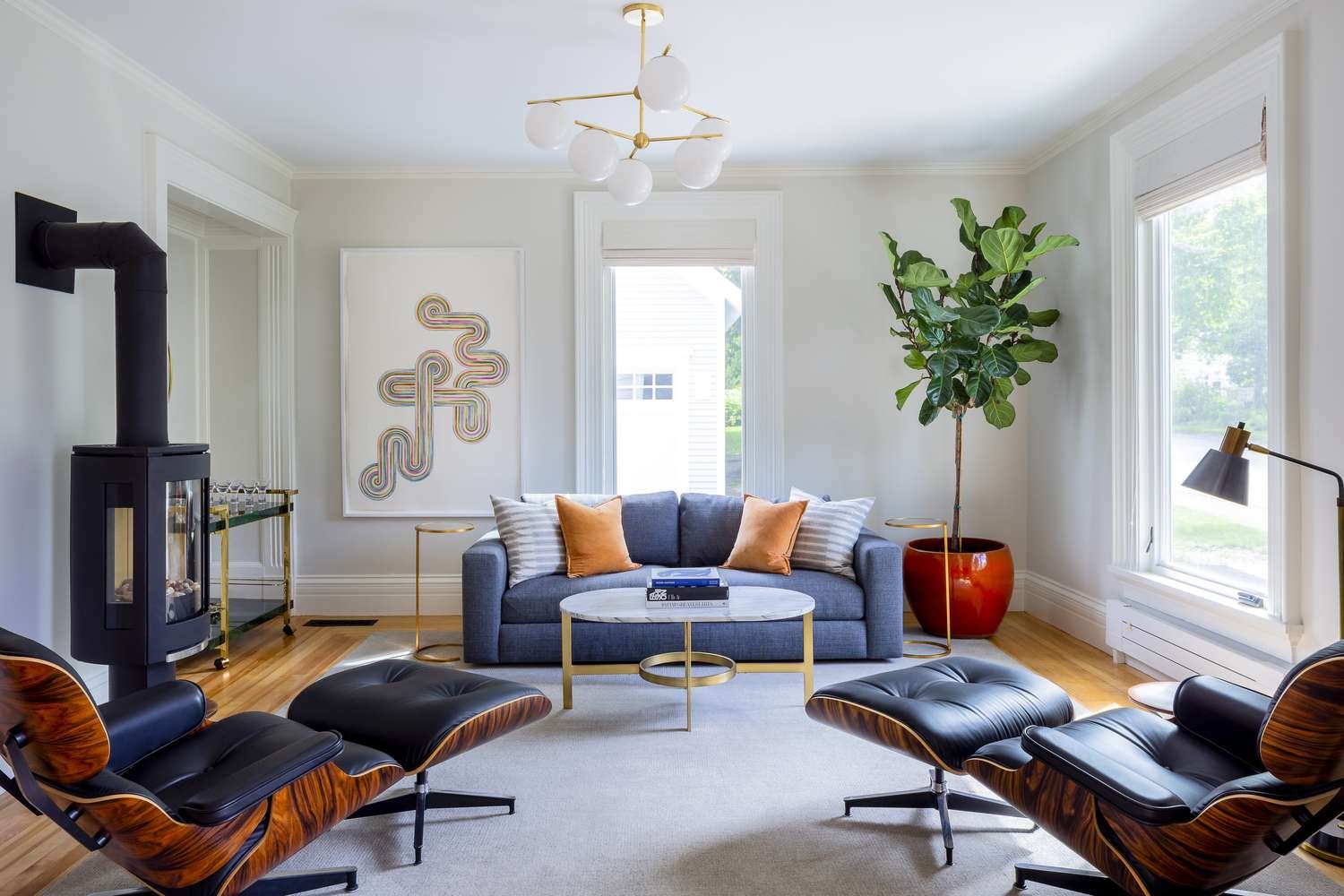 Mid-century modern living room with blue and orange.