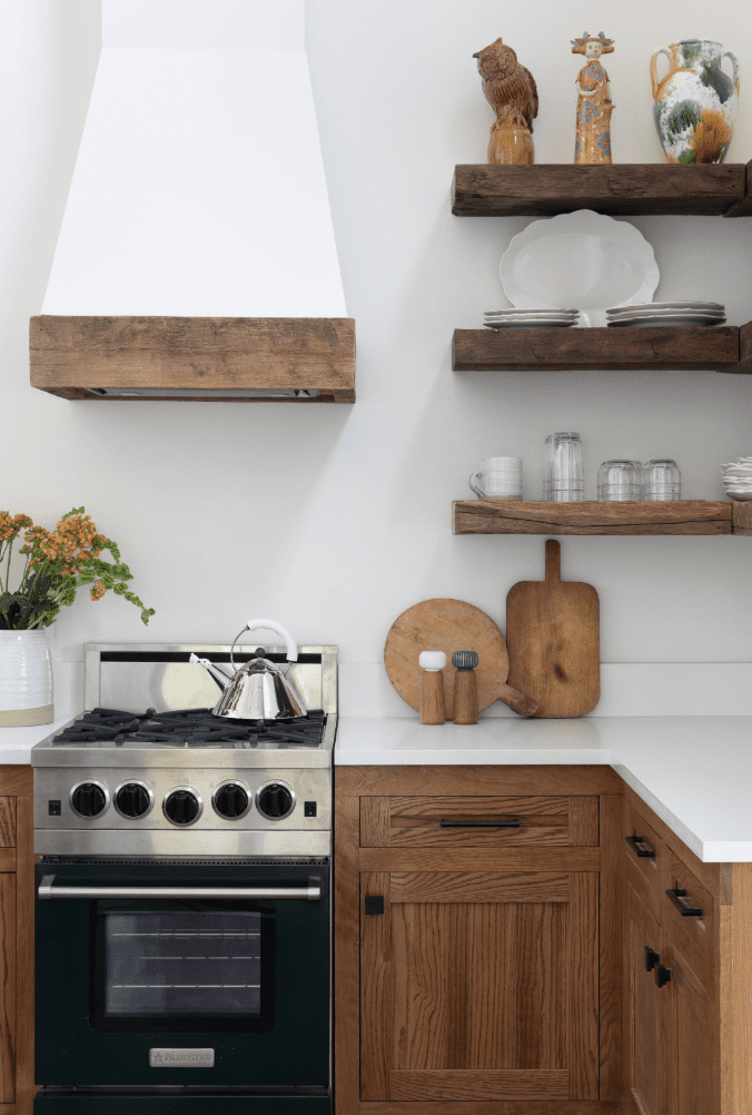 rustic cabinets and wooden range hood