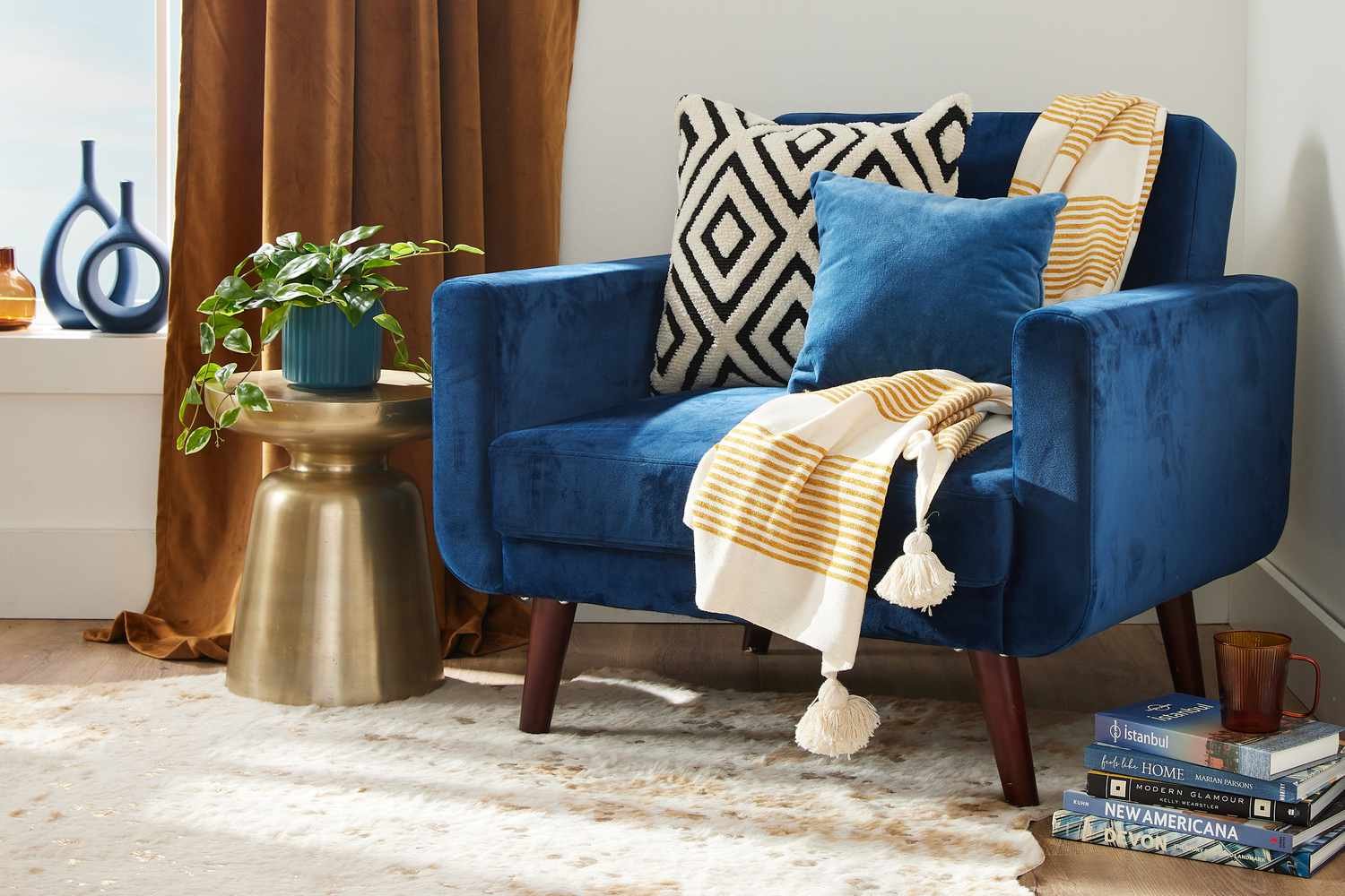 Royal blue Lawson chair in a living room corner