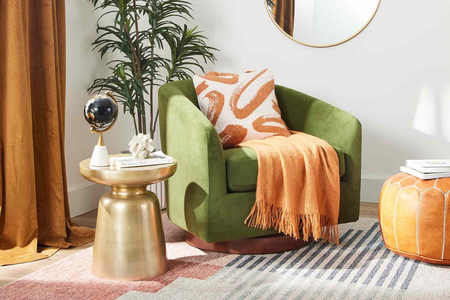 Green barrel chair in a living room corner