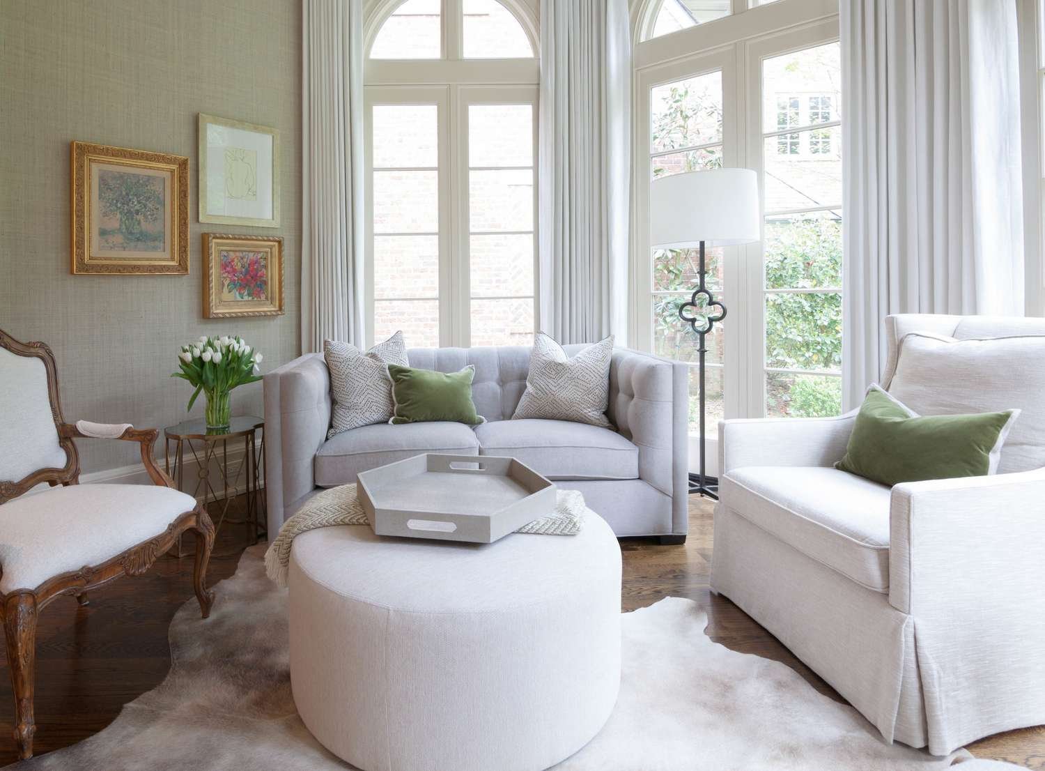 neutral living room with sage green accents