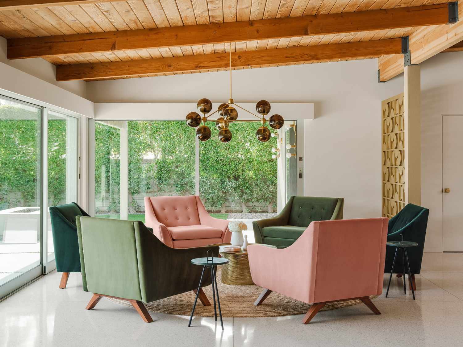 light and dark sage green chairs with pink