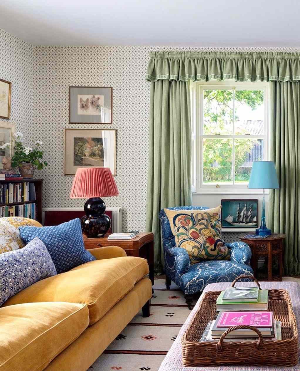 sage green window treatments against polka dot wallpaper