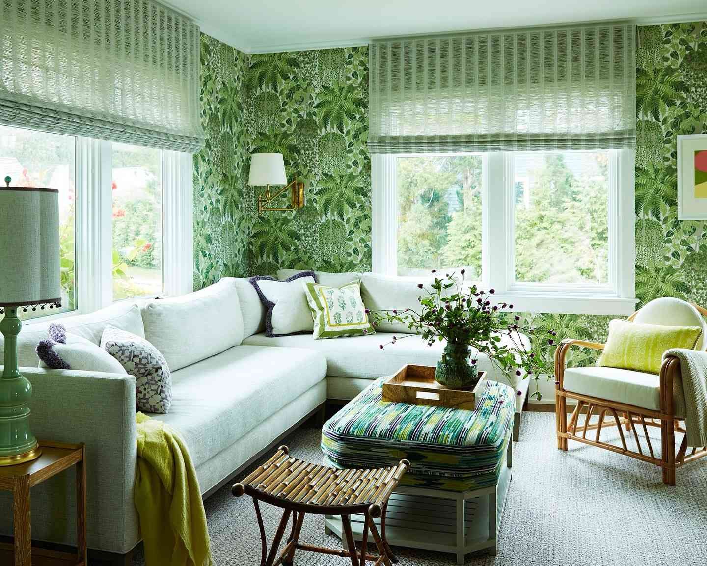 sage green botanical wallpaper in sitting room