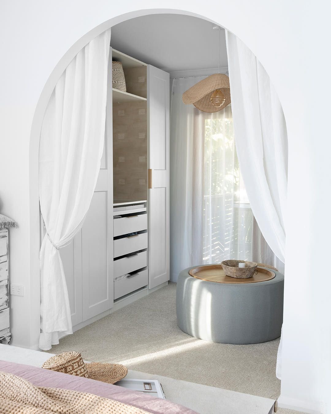 white curtains on walk in closet