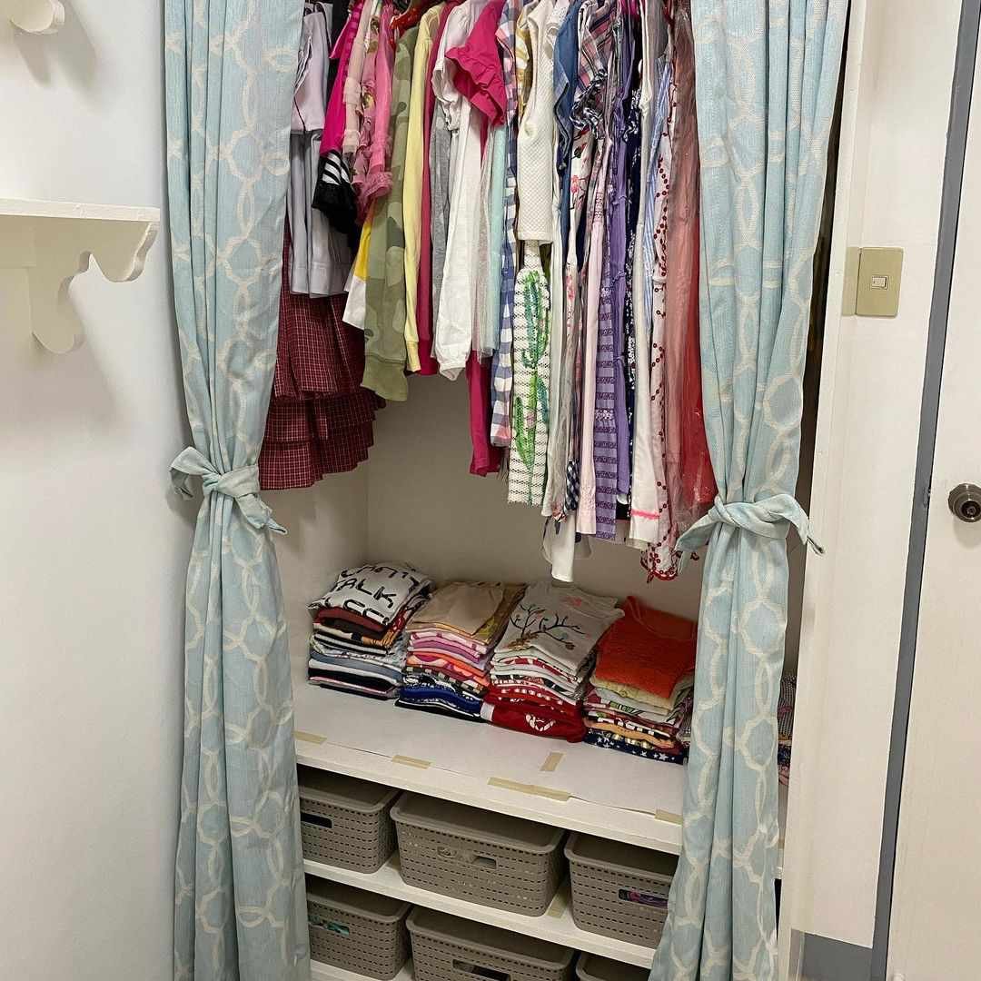 tied blue closet curtains