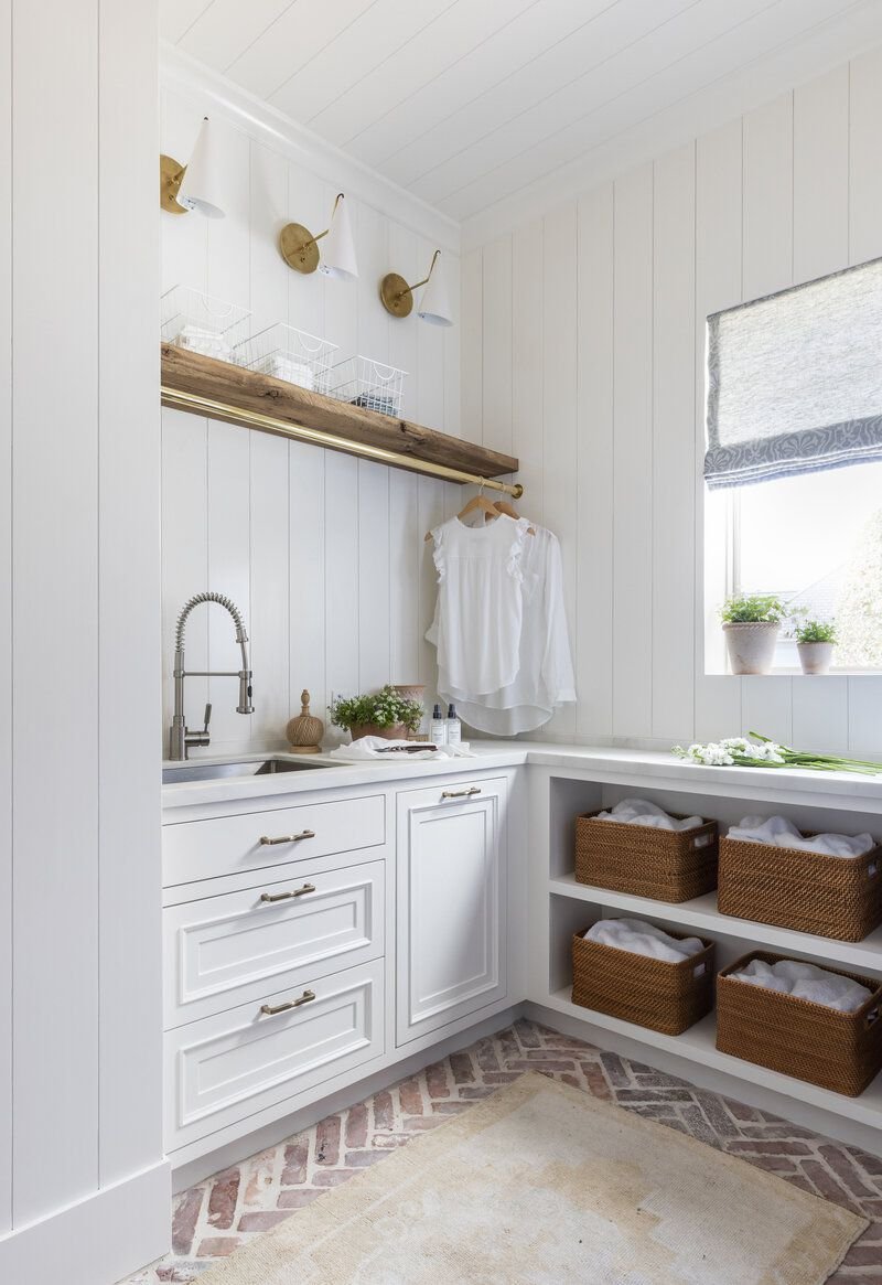 laundry room mudroom with brick tile floor