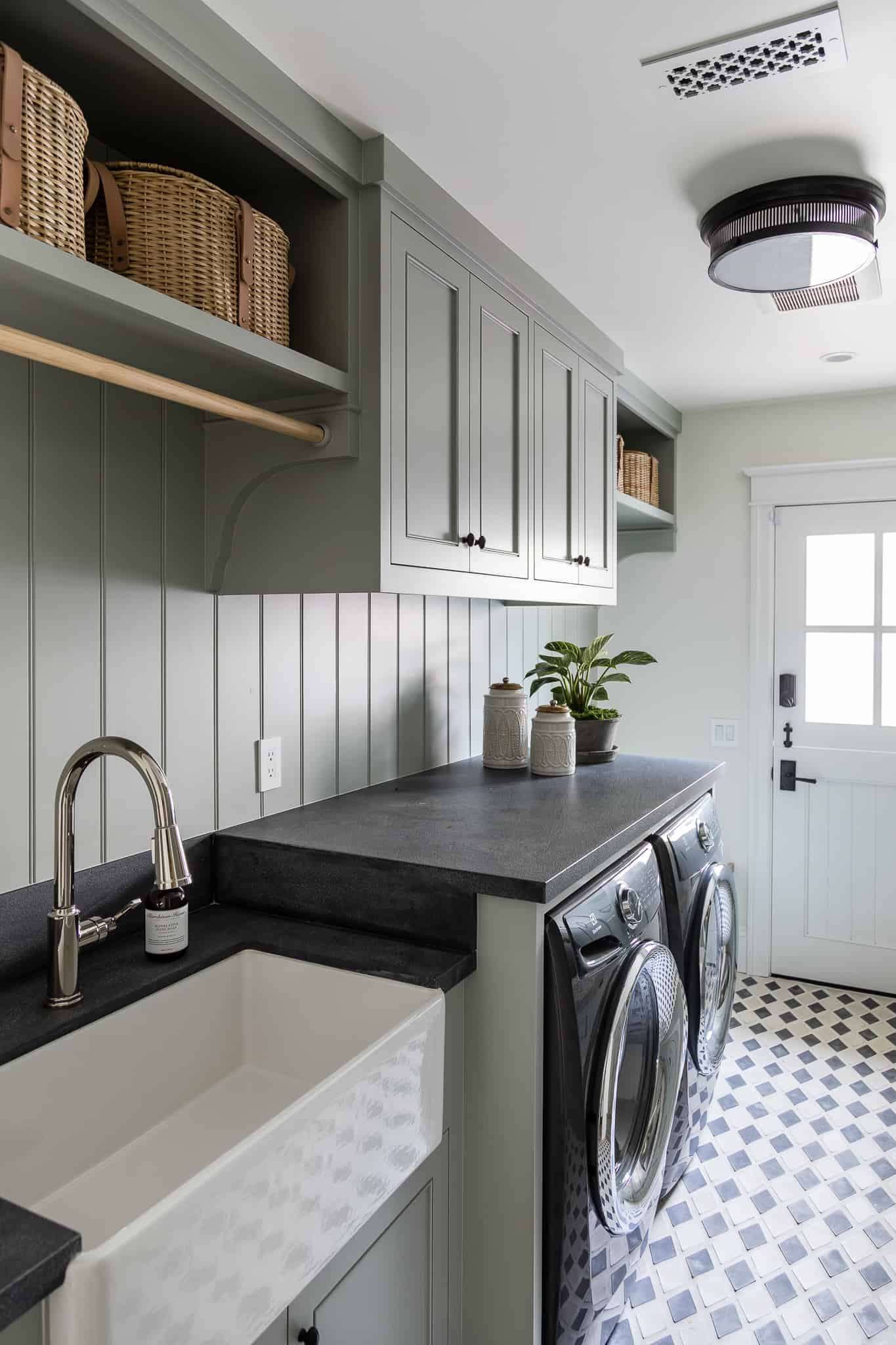 sage green mudroom laundry room