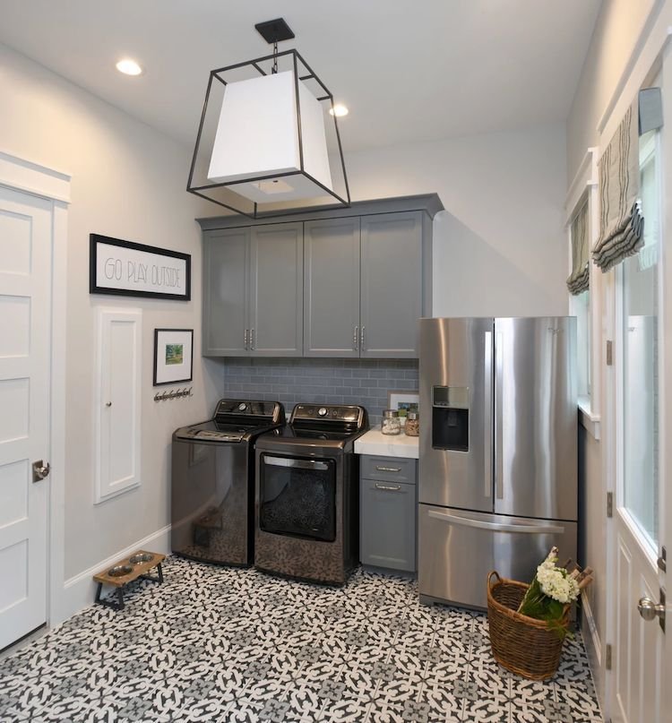 laundry room mud room with patterned tile floor