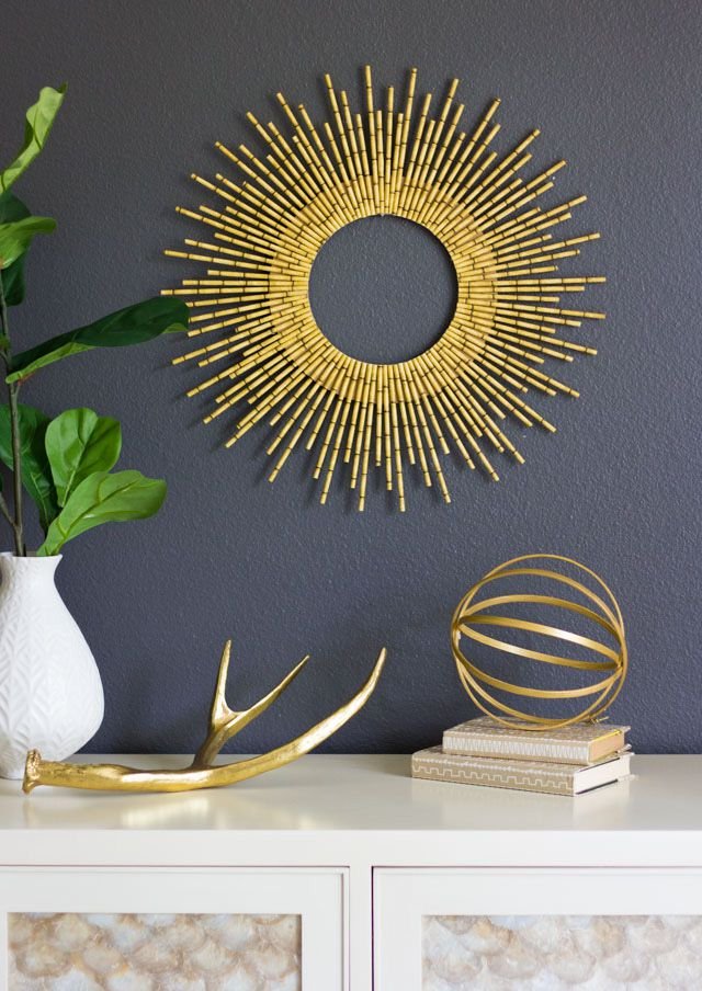 A starburst art piece on a wall