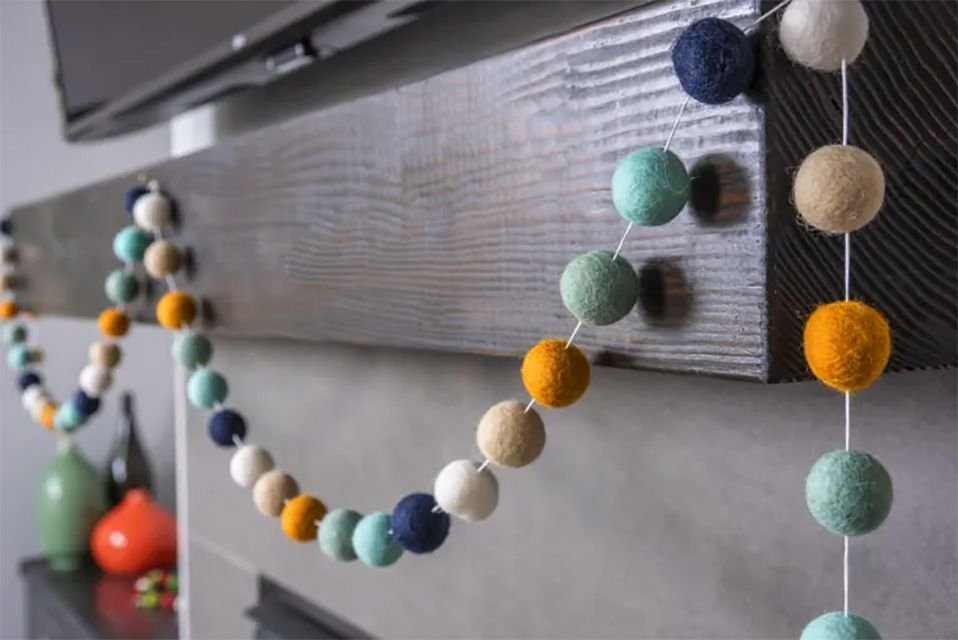 Colorful pom pom balls on a string