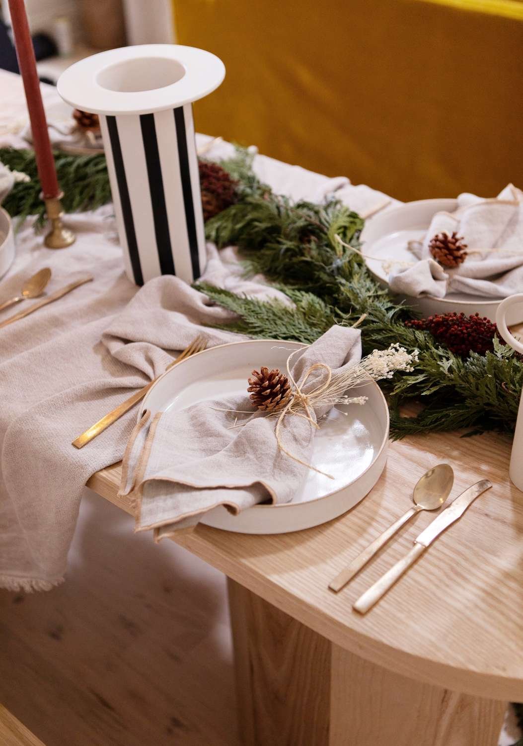 christmas table setting decor with foraged napkin rings