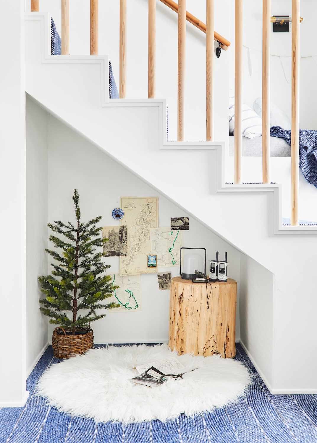 christmas tree under stairs