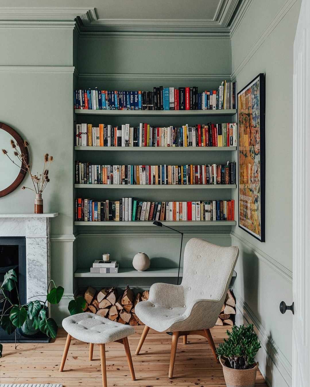 blue gray built in wall with colorful book spines