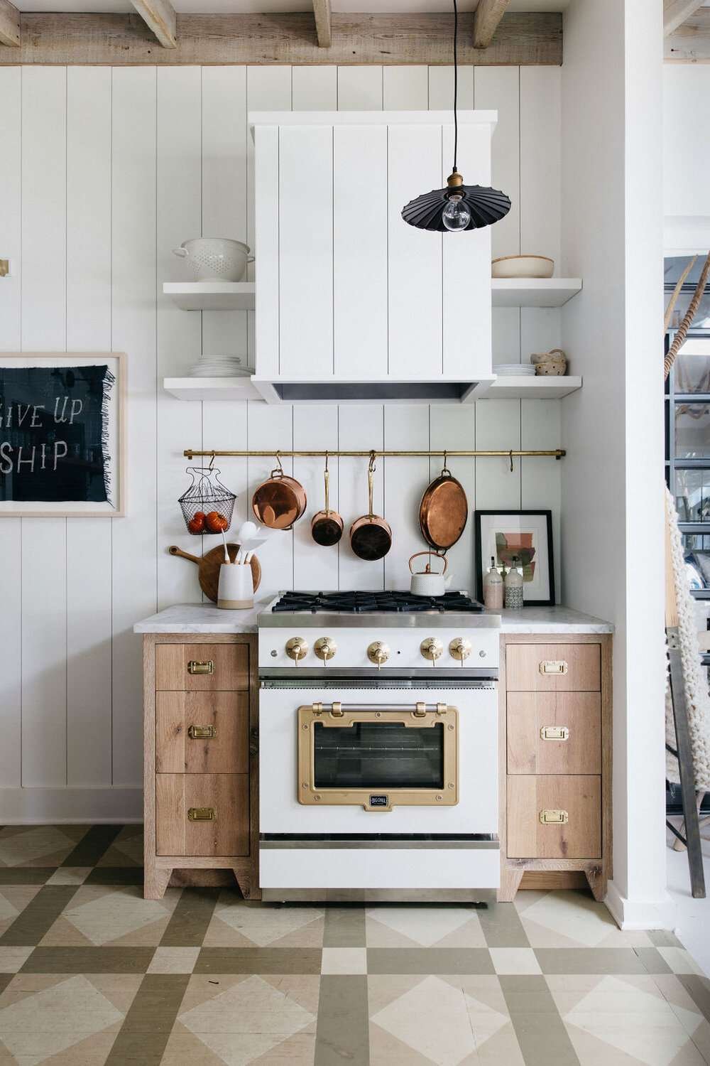 cottage kitchen with copper pot rack