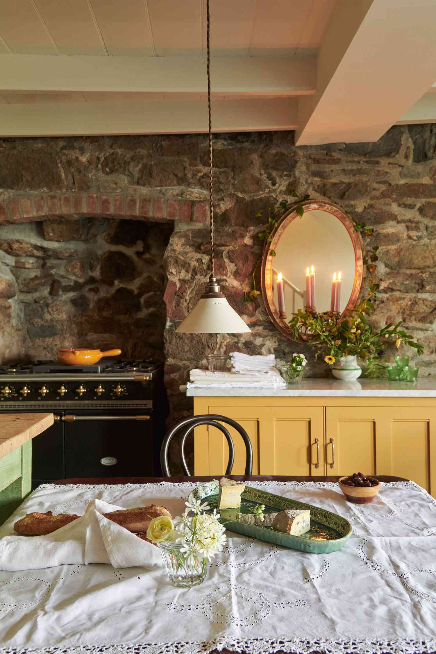 cottage kitchen with stone wall
