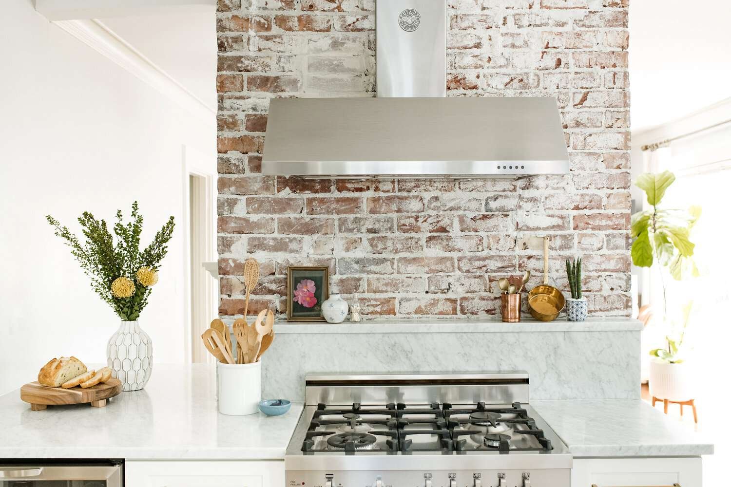 cottage kitchen with exposed brick wall