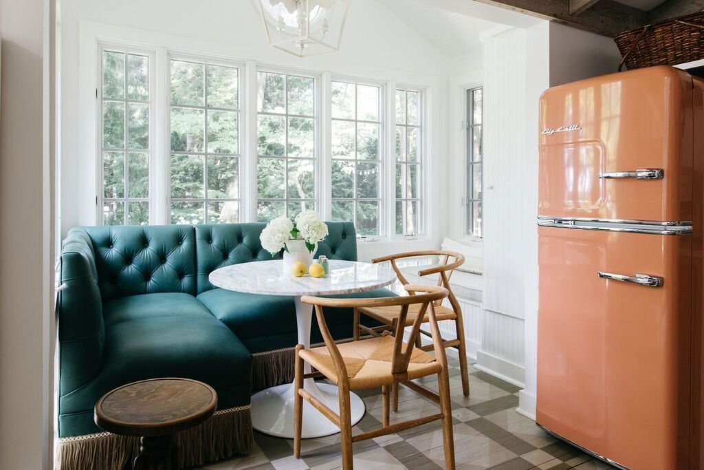 cottage kitchen with mismatched seating